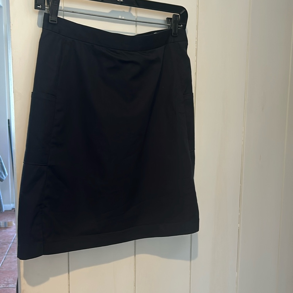 Callaway Golf skort black  size 8 left and right pockets and bottom slits